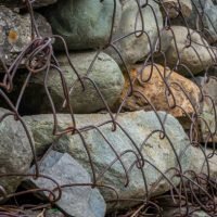gabion wall made up of boulders and steel mesh