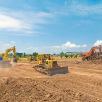 two excavator and one bulldozer on work