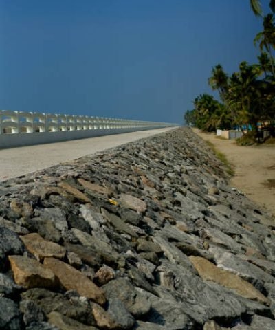 View of seashore walkway with rocks, view from Chellanam in Kochi, India